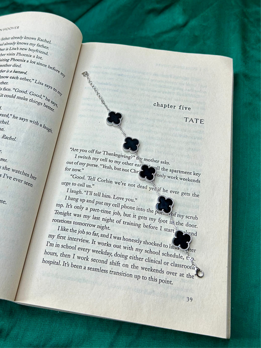 dusk silver bracelet, clover shaped charms in a bracelet,