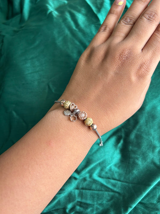 WHISPERS OF CHARM BRACELET