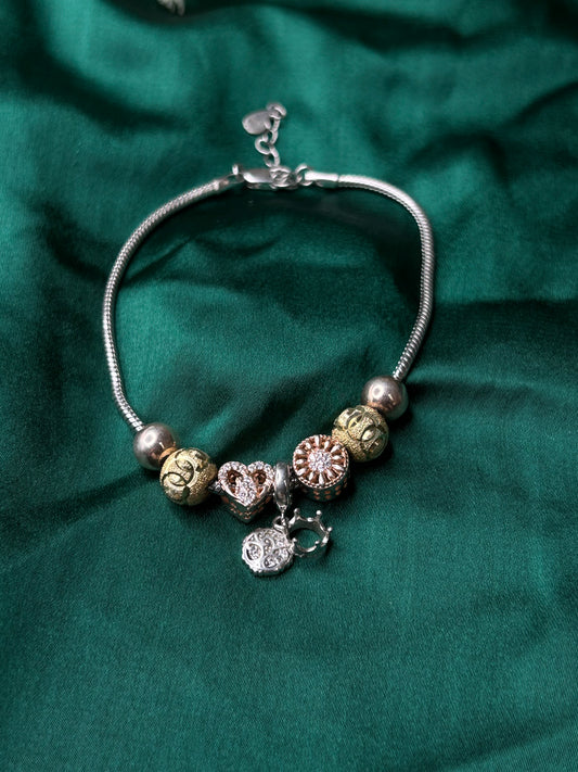 WHISPERS OF CHARM BRACELET